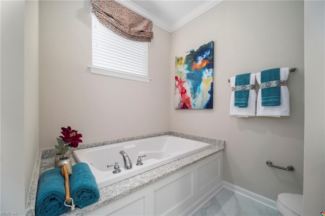 bathroom featuring ornamental molding, toilet, and a tub