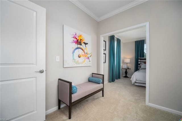 hallway with light colored carpet and crown molding