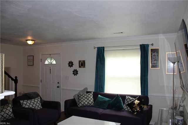 living room featuring ornamental molding