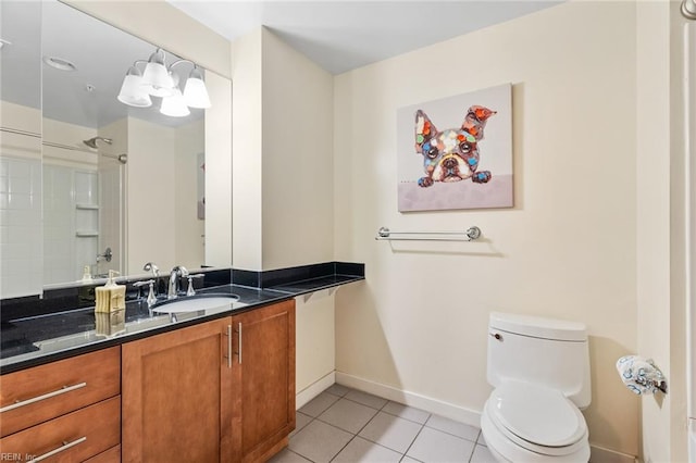 bathroom featuring tile patterned floors, walk in shower, vanity, and toilet