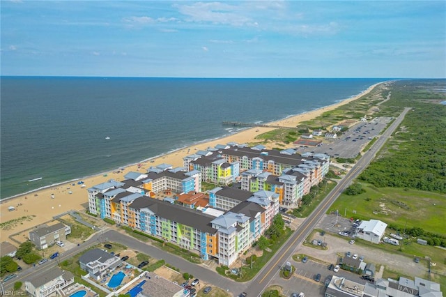 drone / aerial view with a view of the beach and a water view