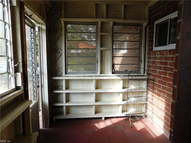 unfurnished sunroom with a healthy amount of sunlight