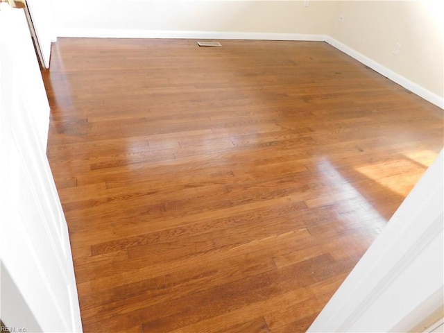 interior details featuring wood-type flooring