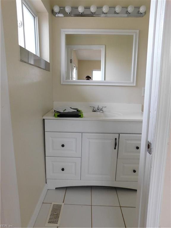 bathroom with vanity and tile patterned floors