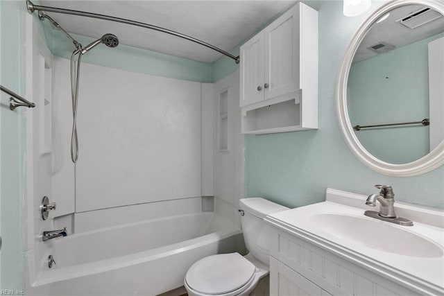 full bathroom with vanity, washtub / shower combination, and toilet