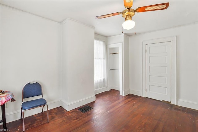 bedroom with ceiling fan and dark hardwood / wood-style floors