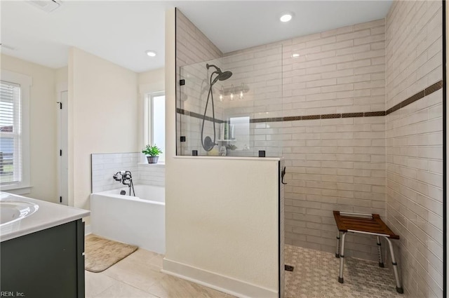 15338 Everets Rd, Windsor, VA 23487 - full bathroom featuring tiled shower, a garden tub, tile patterned flooring, vanity, and recessed lighting