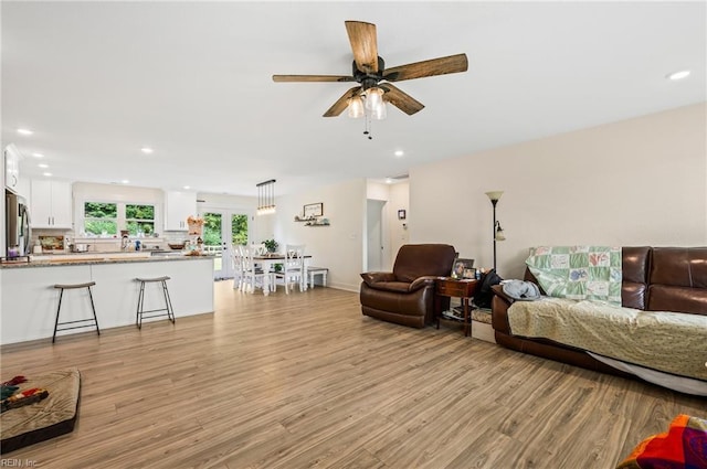 15338 Everets Rd, Windsor, VA 23487 - living room with light wood-type flooring, ceiling fan, and recessed lighting