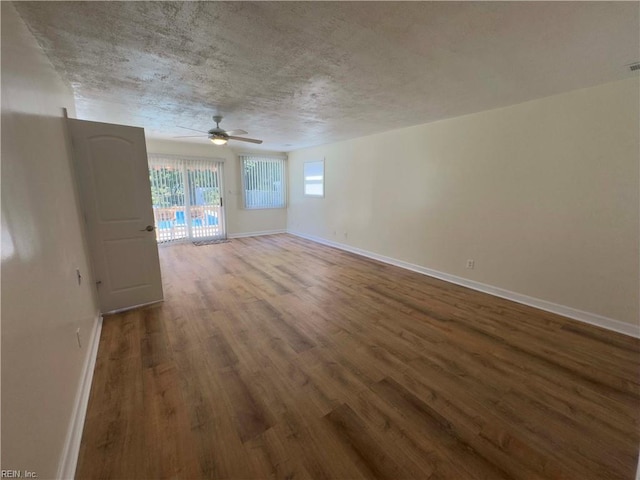 interior space featuring hardwood / wood-style floors and ceiling fan