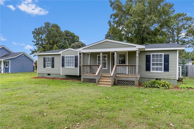 view of front of home with a porch and a front lawn