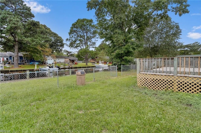 view of yard with a wooden deck