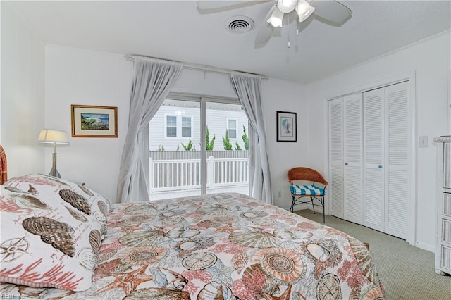 bedroom with access to exterior, ceiling fan, a closet, and light colored carpet