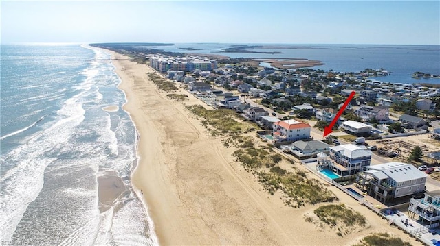 aerial view featuring a beach view and a water view