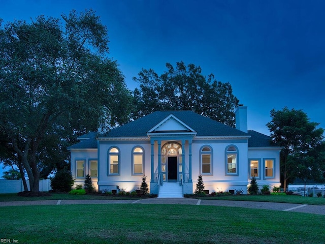 view of front of house with a front yard