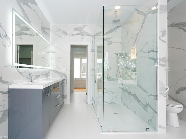 bathroom featuring tile walls, toilet, and an enclosed shower