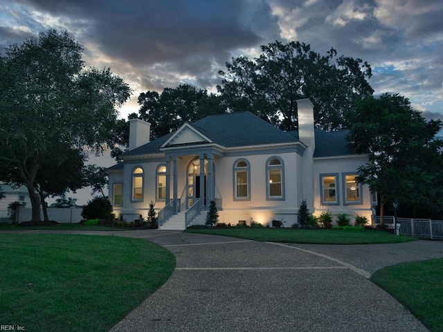 view of front of property with a front lawn