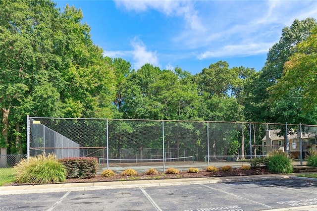 exterior space with tennis court