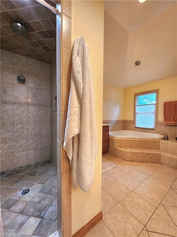 bathroom with shower with separate bathtub