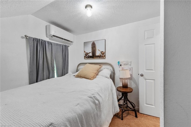 bedroom with light carpet, vaulted ceiling, a textured ceiling, and a wall mounted air conditioner