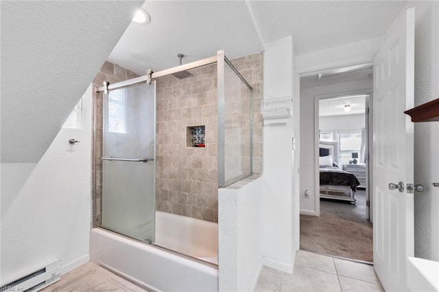 bathroom with combined bath / shower with glass door, a baseboard heating unit, and tile patterned floors