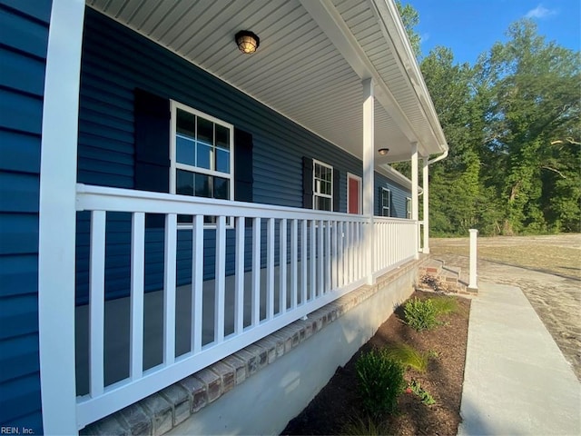 view of property exterior with covered porch