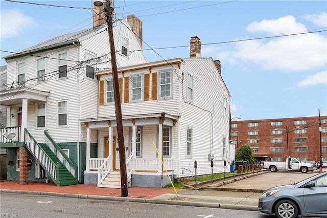 view of property with a porch