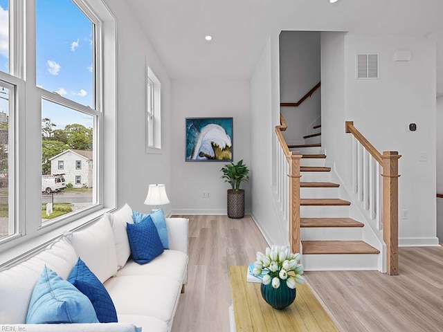 living room featuring light wood-type flooring