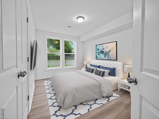 bedroom featuring light wood-type flooring