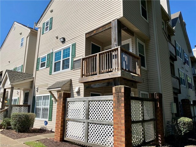 view of home's exterior featuring a balcony