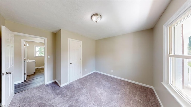 unfurnished bedroom featuring carpet floors