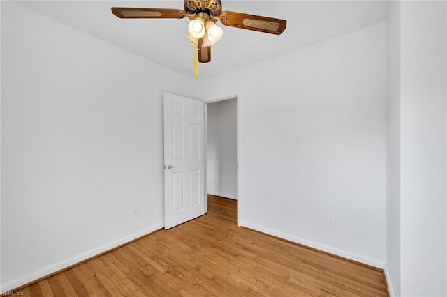 unfurnished room with light hardwood / wood-style flooring and ceiling fan