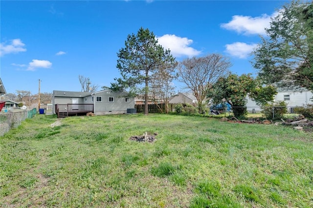 view of yard featuring a wooden deck