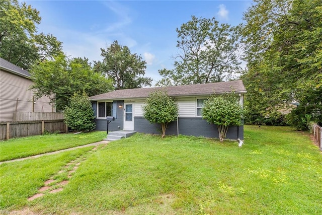 view of front of house with a front lawn