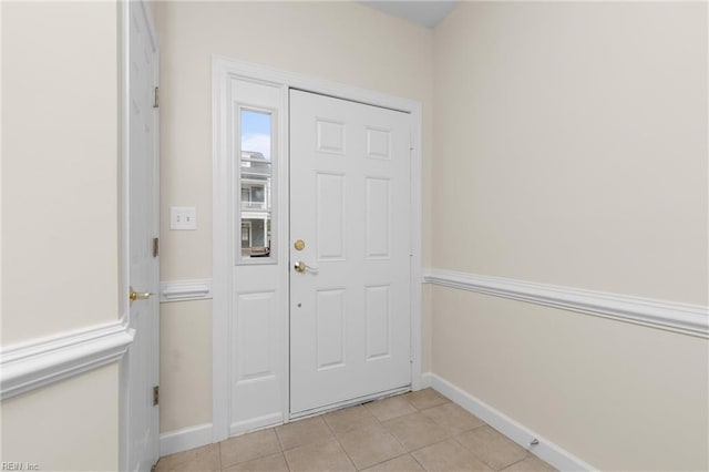 foyer featuring light tile patterned floors