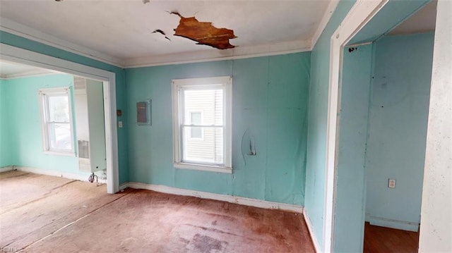 unfurnished room featuring ornamental molding