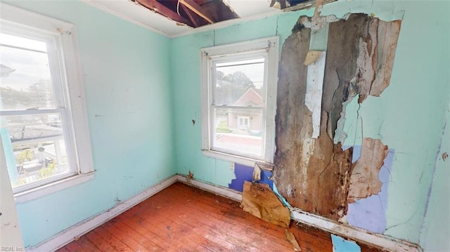 empty room featuring hardwood / wood-style flooring