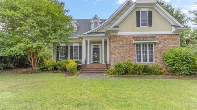 view of front of home with a front yard