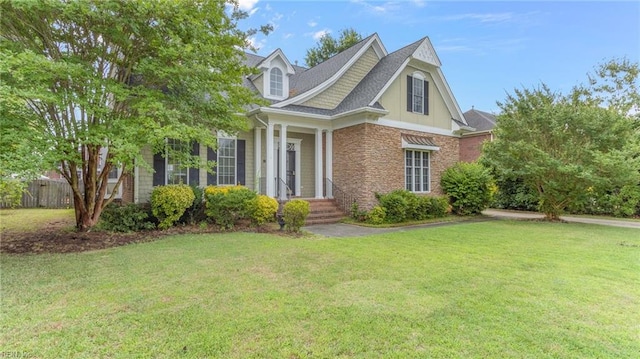 view of front of property with a front lawn