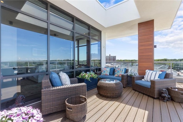 wooden terrace featuring an outdoor living space