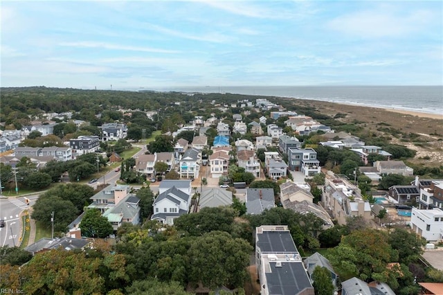 bird's eye view with a view of the beach and a water view