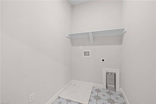 washroom with light floors, baseboards, hookup for an electric dryer, hookup for a washing machine, and laundry area