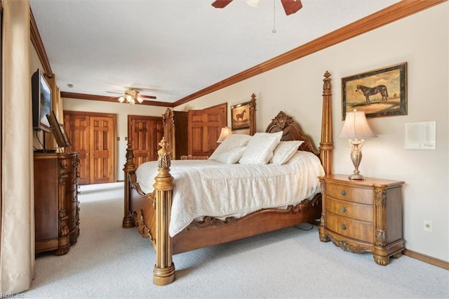 bedroom featuring light carpet, ornamental molding, and ceiling fan