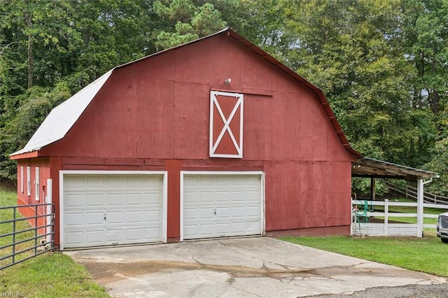 garage with a yard