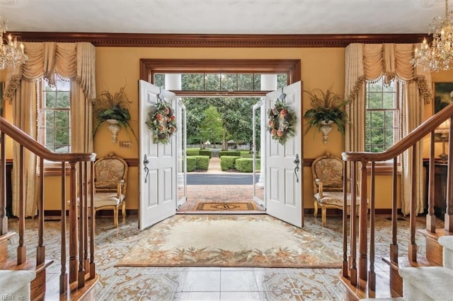 entryway featuring a notable chandelier