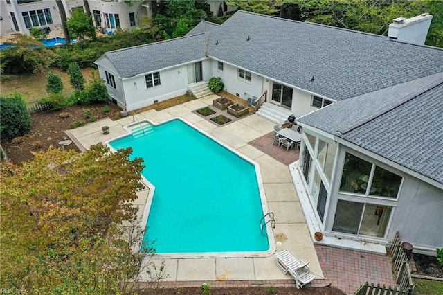 view of pool featuring a patio