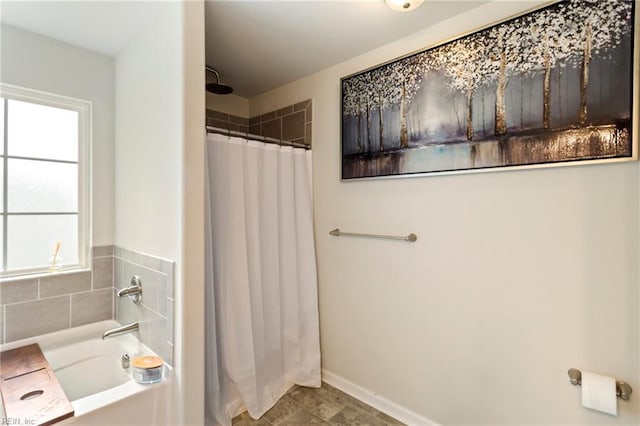 bathroom with plus walk in shower and plenty of natural light