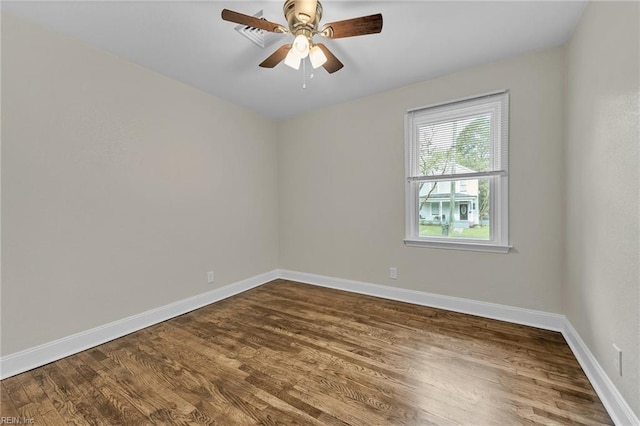 empty room with wood-type flooring and ceiling fan