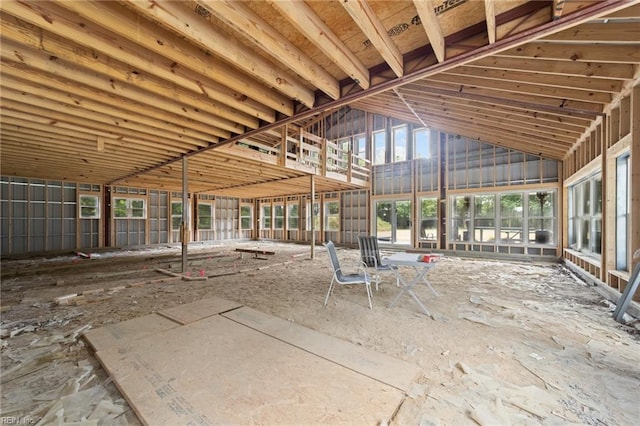 miscellaneous room with high vaulted ceiling