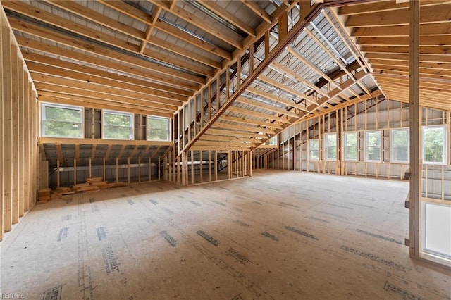 unfinished attic featuring a wealth of natural light