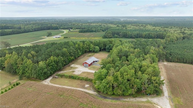 birds eye view of property with a rural view